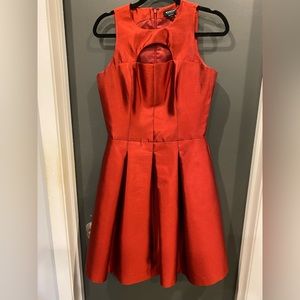 WORTH New York Red Dress. Size 6, 68% wool, 32% silk. Pleated skirt. Lined.